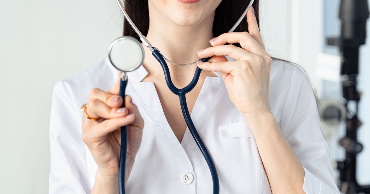 skin clinic: patient checking in at reception