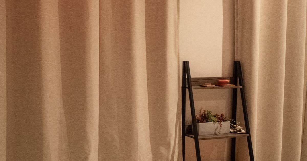 massage center near to me: curtained treatment room ready before the first booking of the day